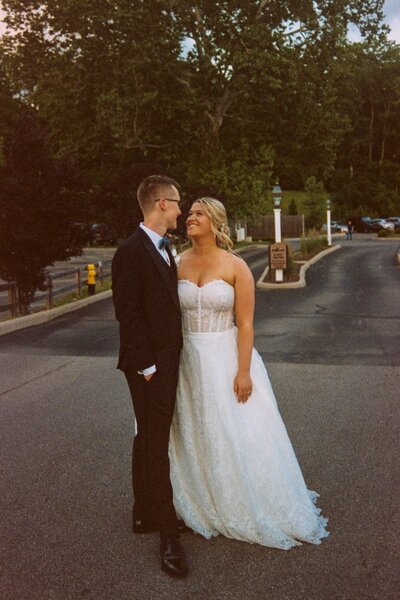 bride and groom looking at one another
