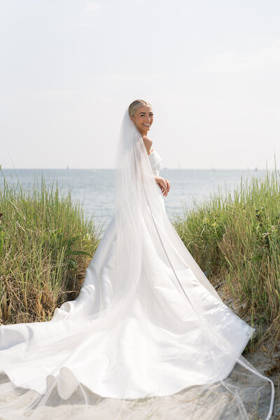 Bride with bouquet and train