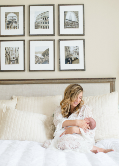 San Diego Newborn Photography, Mother holding baby in bed