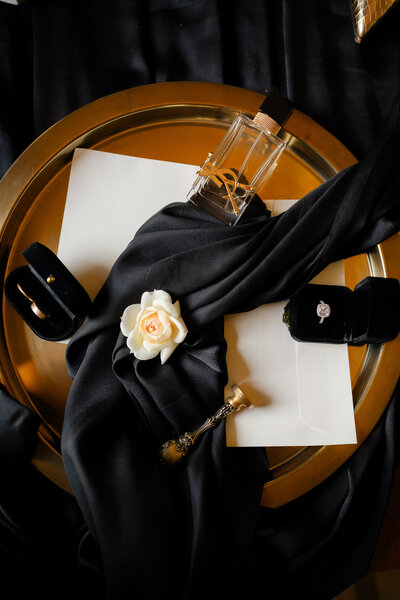 Luxurious wedding flat lay in black and gold