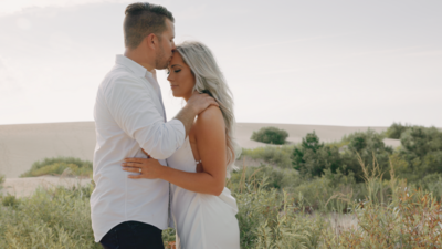 Couple Kisses During Their Engagement Session