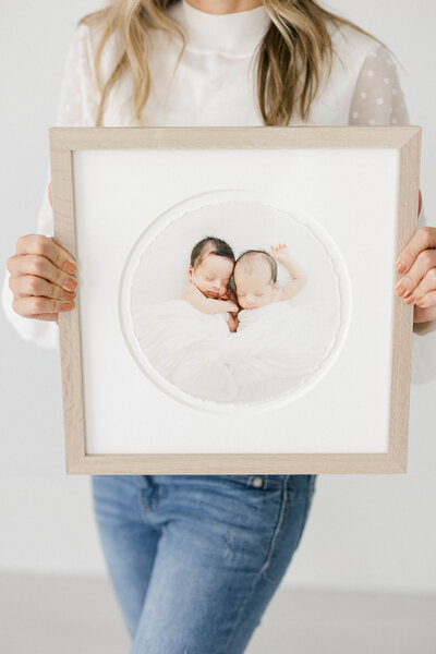 Luxury framed portrait of newborn twins