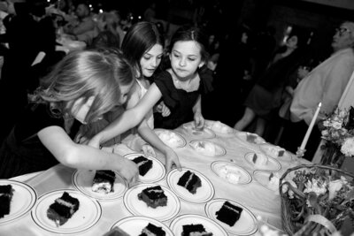 children getting cake at southern spring wedding reception 