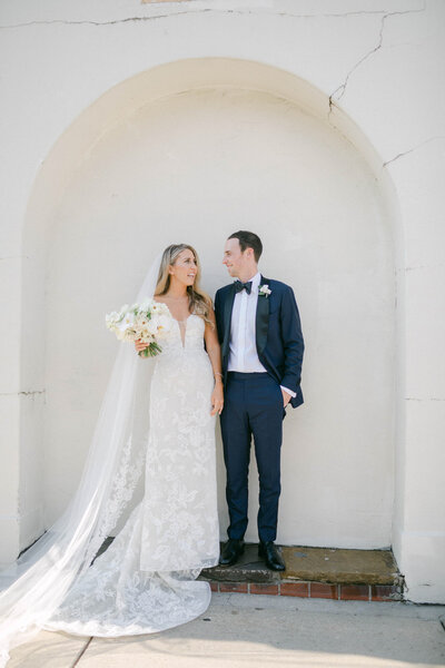 Amanda and Matt standing together on wedding day