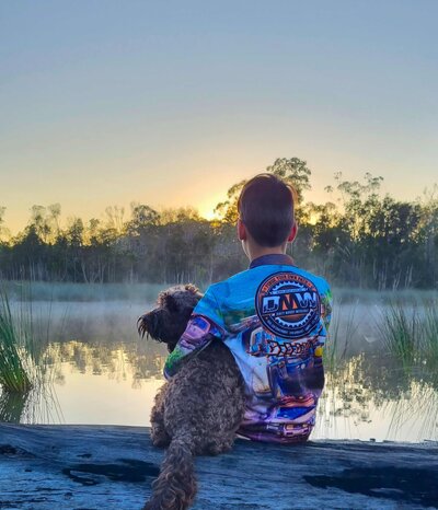 Camping Sunrise boy with Dog