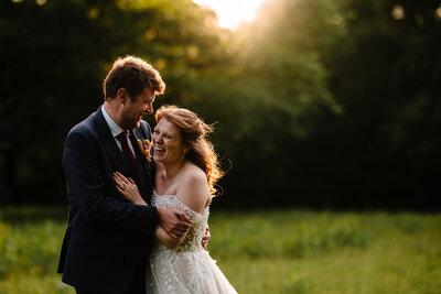 Bride and groom first look photos in field
