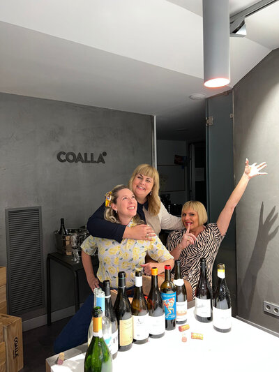 Maria Cristina Barrero and two of her female guests enjoying the gourmet wine tasting experience at Coalla Wine Bar.