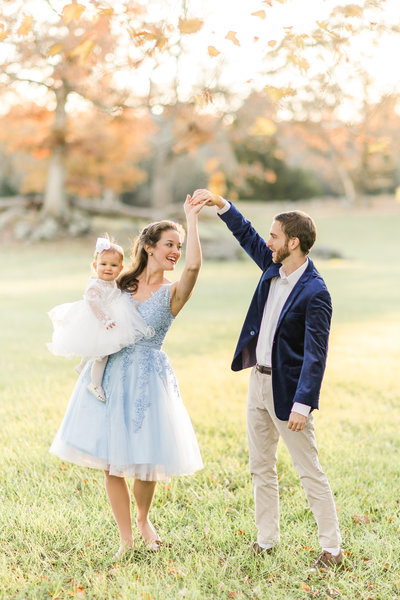 Image of a photographer photographing a bride and her maid of honor.