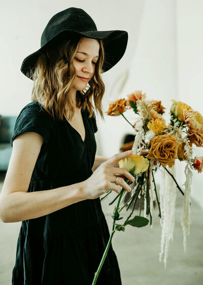 woman holding flowers