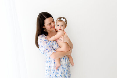 Nicole holding her daughter