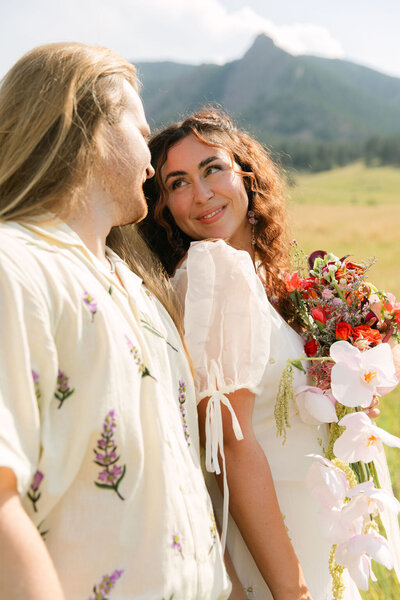 Boulder Colorado Halfway House elopement couple with colorful florals