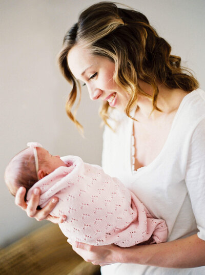 maine film session with mother and newborn daughter By Carrie Pellerin