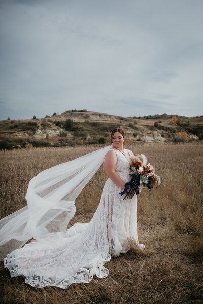 Engagement and wedding photography at Buffalo Gap, Medora, ND, showcasing the stunning beauty of the Badlands. Chelise Boysun captures love, emotion, and the spirit of the couple’s big day against the breathtaking landscapes of North Dakota.

