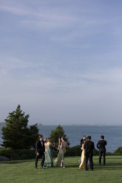 Bride poses near the dunes during Cape Cod wedding.