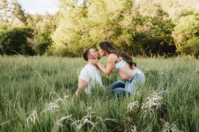 groom holding bride's face at los poblanos organic farm