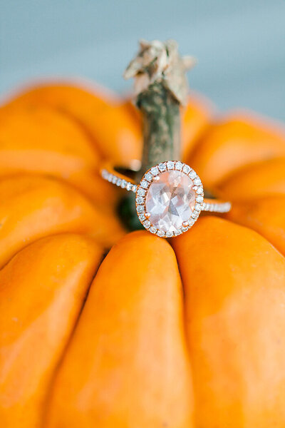 Engagement ring on a pumpkin