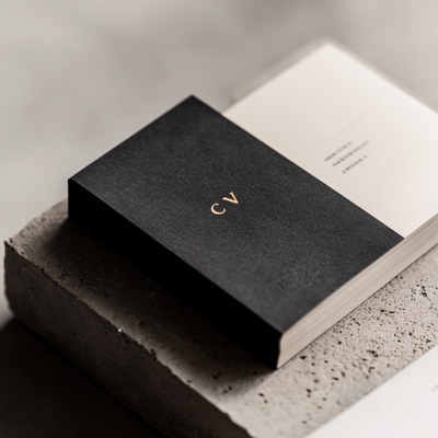 Elegant black and gold invitation card mockup designed by Jasmina Kimova, showcasing luxury branding and immersive visual identity