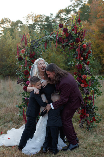 Bride and groom under bride's veil