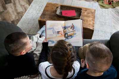 Three kids reading book | Family Session