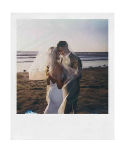 polaroid photo of a bride and groom on the beach in san diego