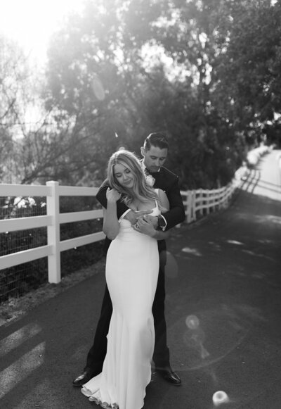 Couple posing for newlywed photos at Temecula wedding venue in California