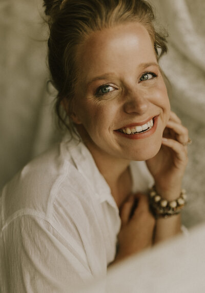 Brittany Fitch, founder of Larks Atelier, specializing in custom website design for wedding professionals