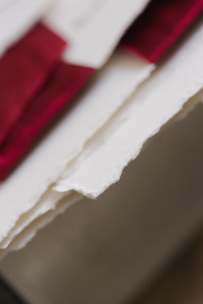 Couple's name imprinted on pocket of invitation