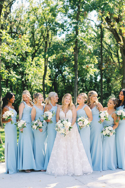 bride and bridesmaids smiling