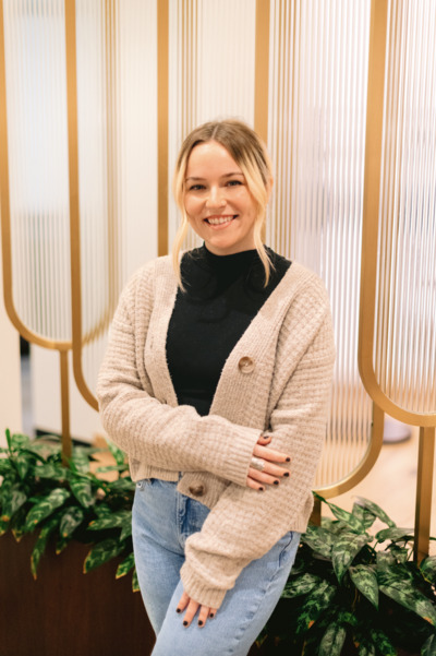 Anxiety therapist for kids, teens and adults in Raleigh standing staring at camera