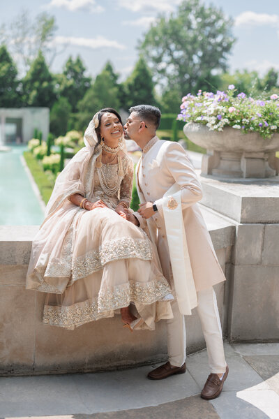 Groom kissing bride