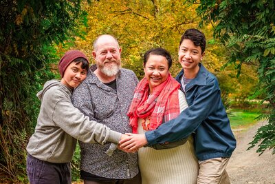Family of four during autumn family photoshoot