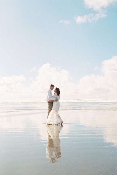 Winter elopement in the surf on Moonstone Beach