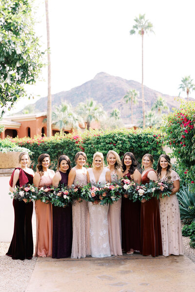 Blush and burgundy bridesmaids at Omni Montelucia Wedding