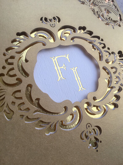 Gold foil monogram with  custom laser cut folder  stationery