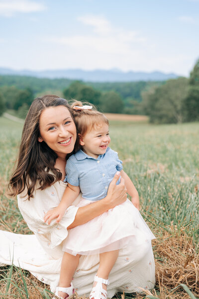 family photo session at the Biltmore Estate with toddler and newborn baby girl and Asheville Newborn Photographer