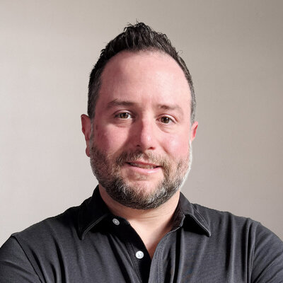 Founder and principal CPA of an accounting firm located in Nashville, Tennessee, wearing a dark collared shirt and exuding a professional demeanor.