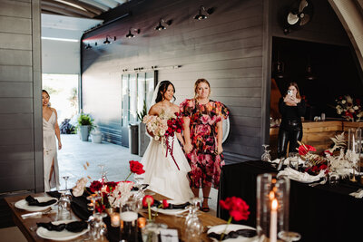Modern Red and Black Vietnamese-Chinese Fusion Wedding at Bleeks and Bergamot - Captured by Hello Lovely Photography, this vibrant photo highlights a contemporary wedding that beautifully blends Vietnamese and Chinese traditions with a modern red and black color scheme. The image showcases the striking décor, elegant fusion of cultural elements, and the unique, stylish atmosphere of the celebration at Bleeks and Bergamot, reflecting a memorable and visually stunning event.