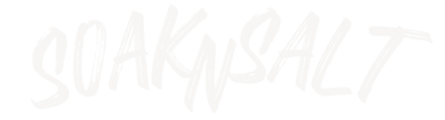 White stylized text on a transparent background spells “SOAKSALT” in a bold, jagged, handwritten-style font—perfect for message therapy businesses in Tolleson, Arizona.