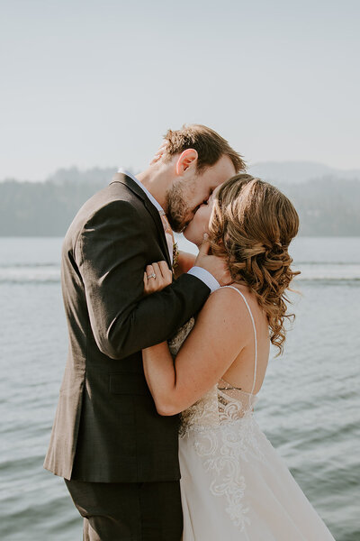 Couple hugging during their romantic mountain top elopement on the Sunshine Coast B.C