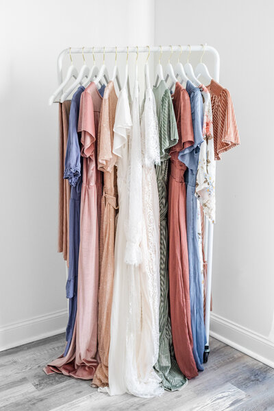 A rack of dresses in a photography studio in Huntsville Alabama