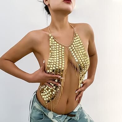 woman wearing gold body jewelry