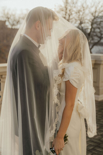 utah-wedding-veiled-couple-sunset-intimate