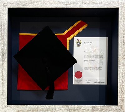 Memorial flowers preserved and displayed in a personalised shadow box frame.
