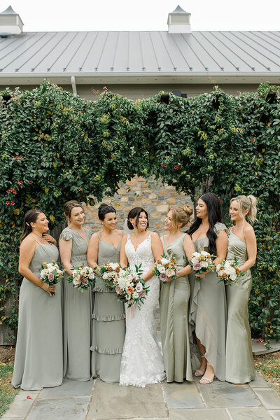 bride and groom posing during sunset