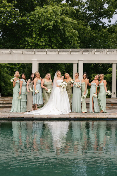 Bride with her bridesmaids at timeless, outdoor Nashville wedding