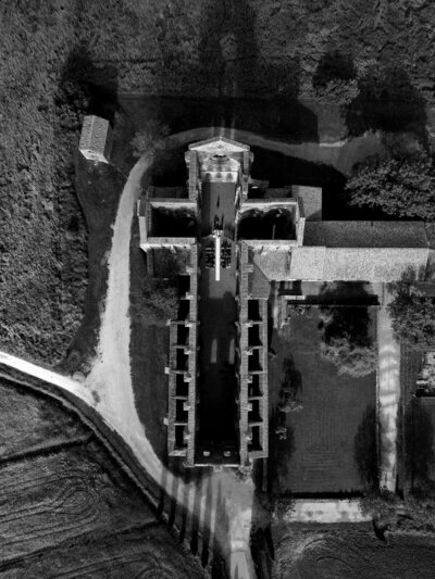 Drone photography of the Abbey of San Galgano in Tuscany Italy during a wedding ceremony, documented by Andrea-Marie Photography