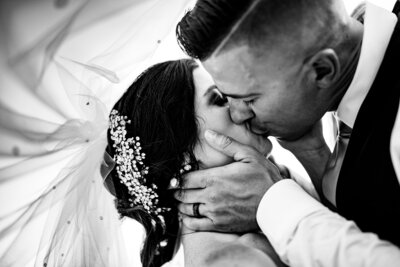 Black and White image of Bride and Groom embracing Seattle Wedding