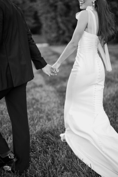 Bride and groom walk up memorial steps at their DC wedding