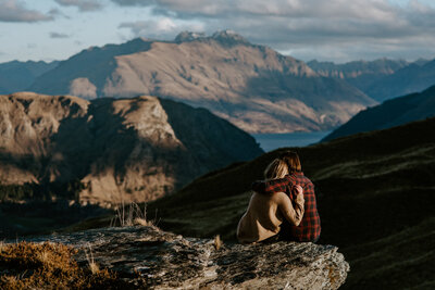 Couple enjoying the view in Queenstown New Zealand