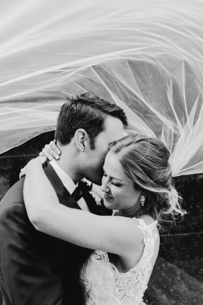 Bride and groom walk up memorial steps at their DC wedding